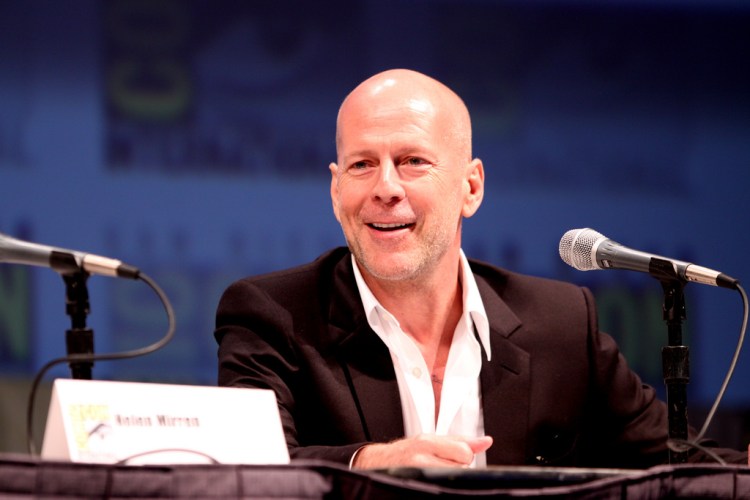 Actor Bruce Willis on the Red panel at the 2010 San Diego Comic Con in San Diego, California. LicenseSome rights reserved by Gage Skidmore