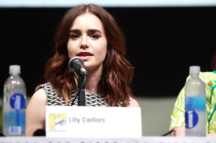 Lily Collins speaking at the 2013 San Diego Comic Con International, for "The Mortal Instruments: City of Bones", at the San Diego Convention Center in San Diego, California. LicenseSome rights reserved by Gage Skidmore 